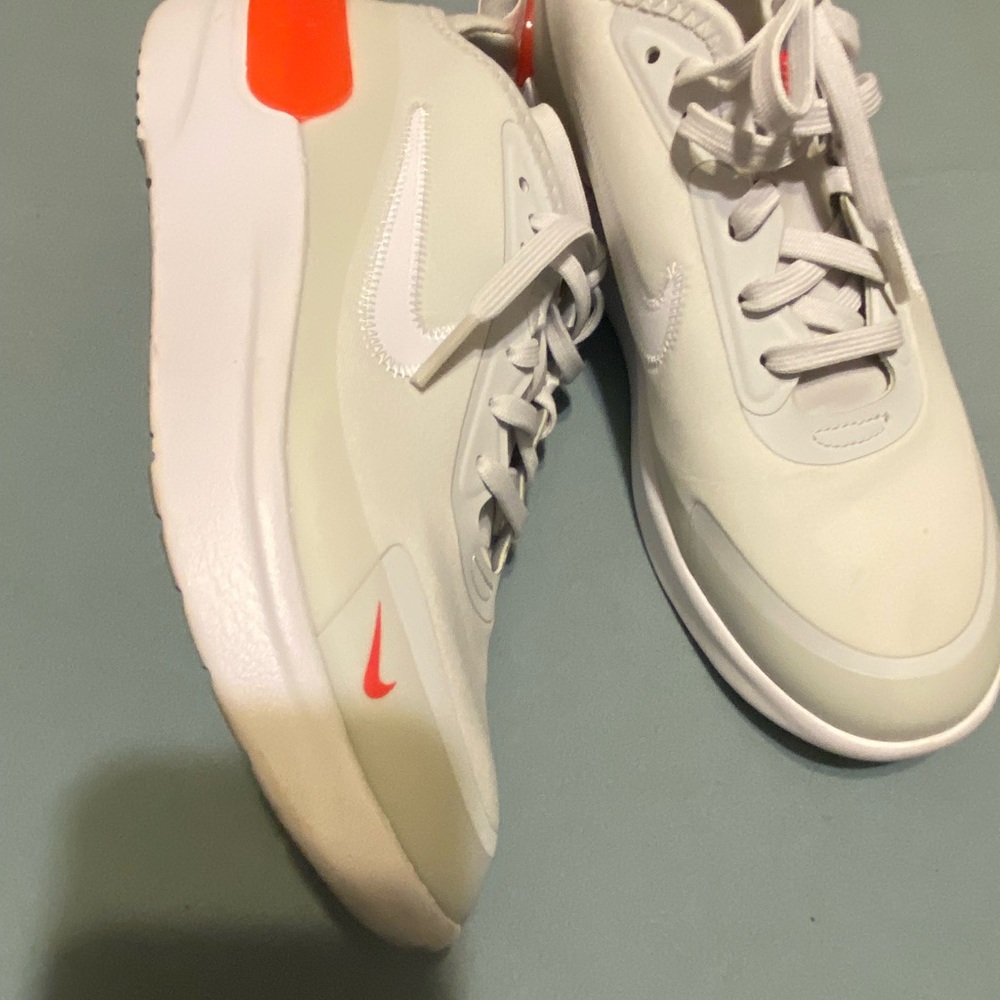 7.5 light grey white & with red stripe on the back Nike barely worn real offers